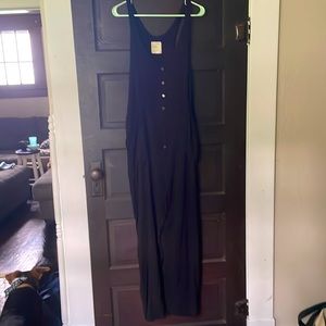 Oversized medium romper. Never worn! Large pockets!